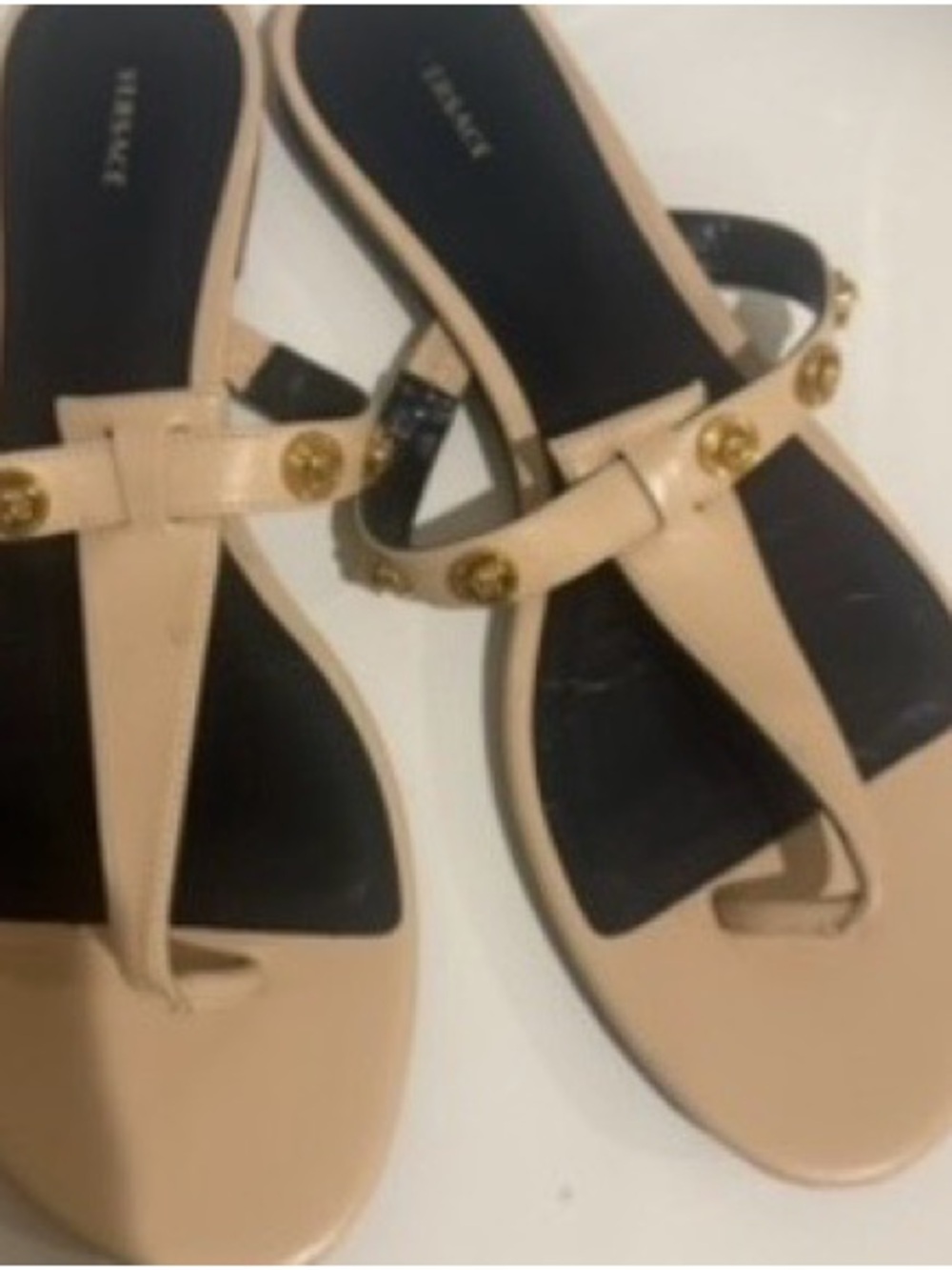 Versace Women’s Beige Leather Flat Thong Sandals with Gold Medusa Accents